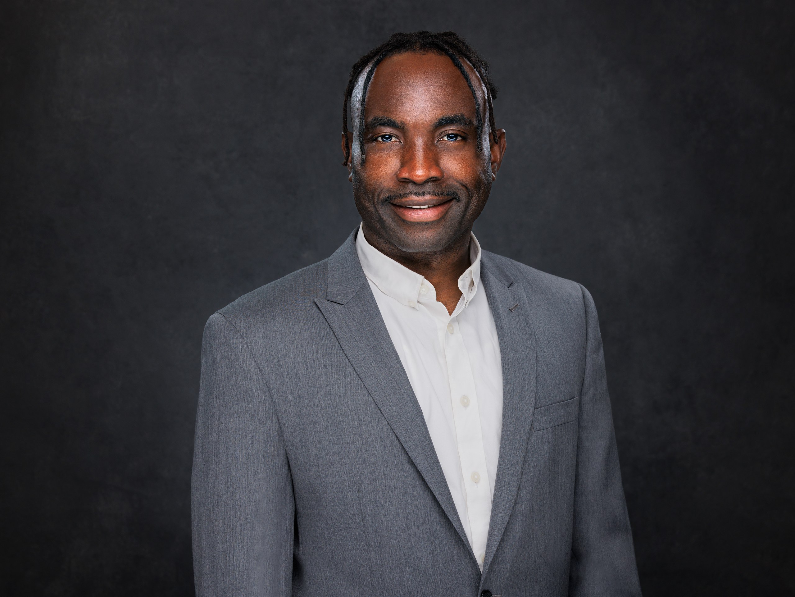 Dr. Josh McWealth Unamba, Doctor of Organizational Psychology, portrait